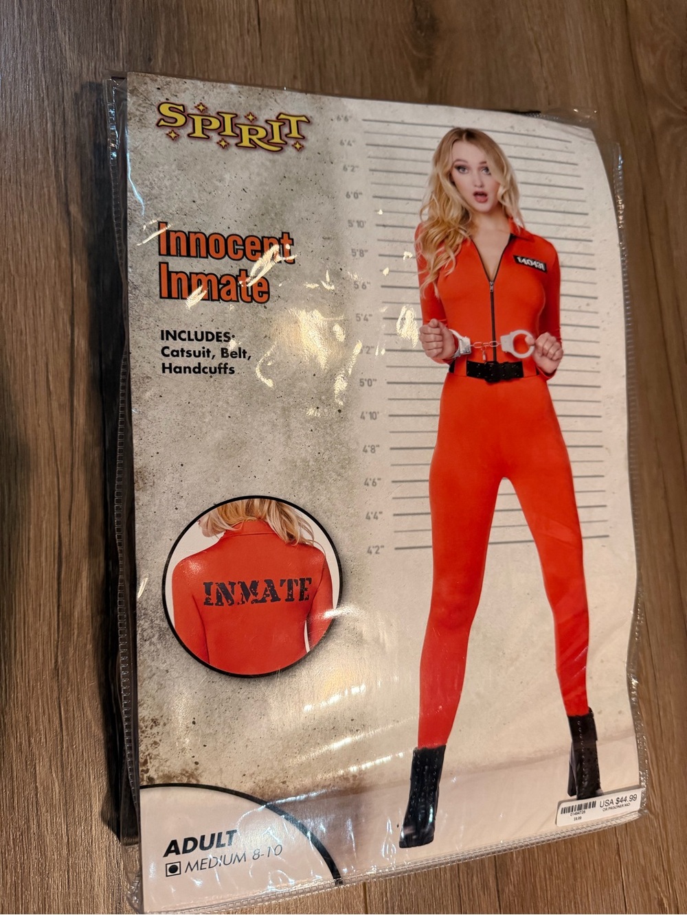 Spirit Halloween Women’s ‘Innocent Inmate’ Orange Catsuit Costume Prisoner Sexy
